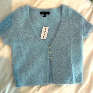 This is a fuzzy cropped top from Pacsun